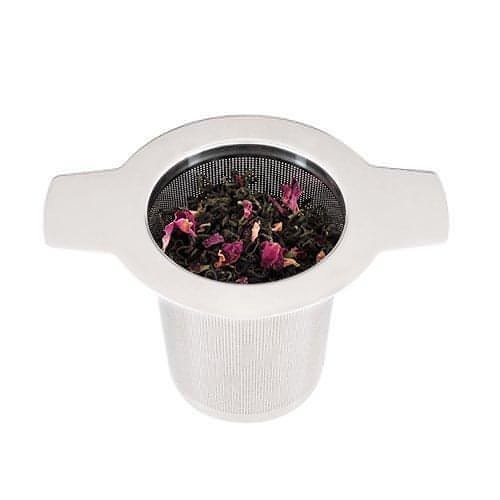 A close up photo of a cylindrical shaped tea infusing filter filled with dried flower buds on a white background.