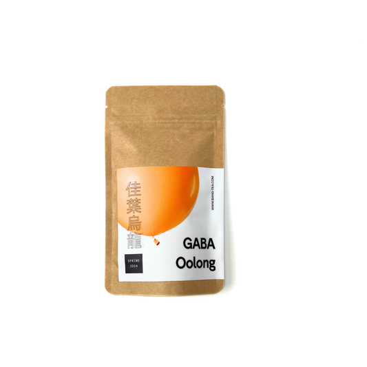 A package of BANGtea GABA Oolong tea on a white background, with a label featuring the tea's name and a brief description.